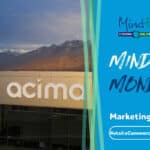 Mindful Coding Solutions marketing showcase featuring "Acima" branding on building, mountains in background, emphasizing digital marketing services.